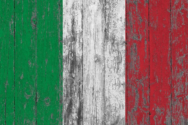 Flag of Italy painted on worn out wooden texture background.