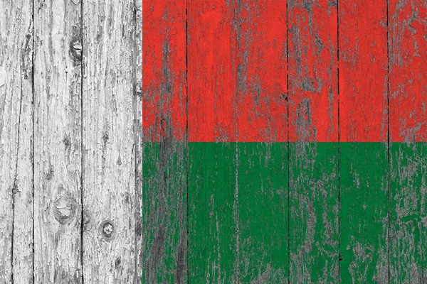 Flagge Von Madagaskar Auf Abgenutztem Hölzernen Hintergrund Gemalt — Stockfoto
