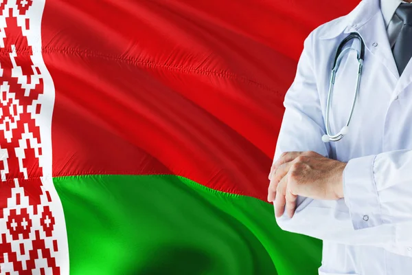 Belarusian Doctor standing with stethoscope on Belarus flag background. National healthcare system concept, medical theme.
