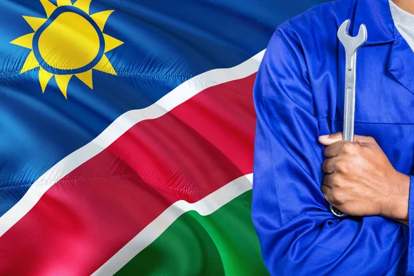Намібійським Механік Синій Формі Тримає Гайковий Ключ Розмахував Прапором Тлі — стокове фото