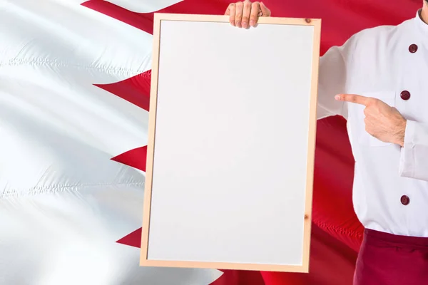 Bahraini Chef Holding Blank Whiteboard Menu Bahrain Flag Background Cook — Stock Photo, Image