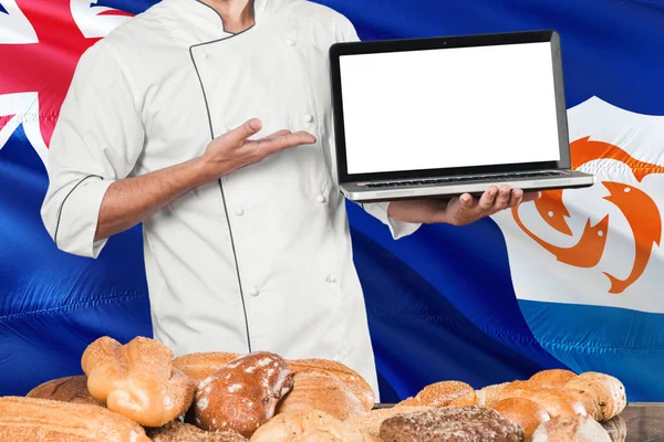 Anguillian Baker Holding Laptop Anguilla Flag Breads Background Chef Wearing — Stock Photo, Image