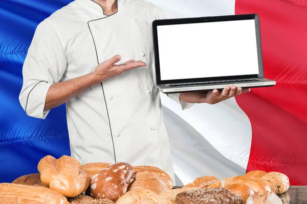 French Baker Holding Laptop France Flag Breads Background Chef Wearing — Stock Photo, Image