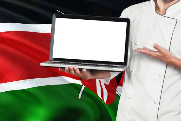 Kenyai Chef Gazdaság Laptop Val Üres Képernyő Kenya Flag Háttér — Stock Fotó