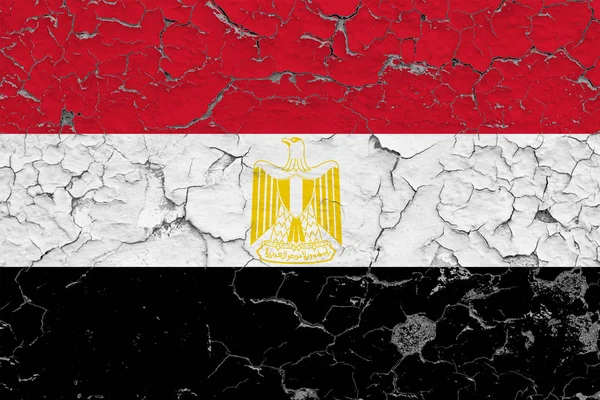 Flag of Egypt painted on cracked dirty wall. National pattern on vintage style surface.