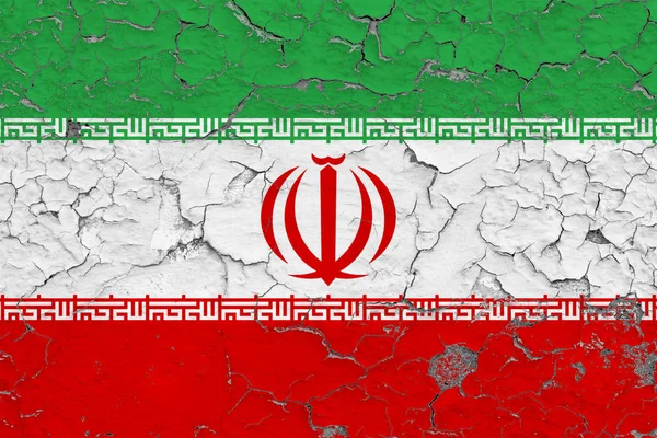Flag of Iran painted on cracked dirty wall. National pattern on vintage style surface.