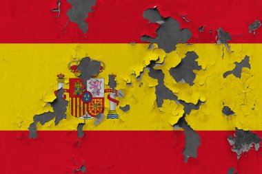 Duvar boya yüzeyi içinde görmek için kapalı soyulması grungy, hasarlı ve yıpranmış İspanya bayrağını Kapat.