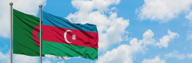 Cezayir ve Azerbaycan bayrağı havada havada sallanıyor. Diplomasi kavramı, uluslararası ilişkiler.