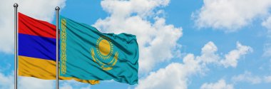 Ermenistan ve Kazakistan bayrağı havada havada sallanıyor. Diplomasi kavramı, uluslararası ilişkiler.