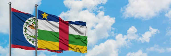 Belize and Central African Republic flag waving in the wind against white cloudy blue sky together. Diplomacy concept, international relations. — Stock Photo, Image