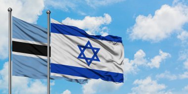 Botsvana ve İsrail bayrağı birlikte beyaz bulutlu mavi gökyüzüne karşı rüzgarda sallayarak. Diplomasi kavramı, uluslararası ilişkiler.