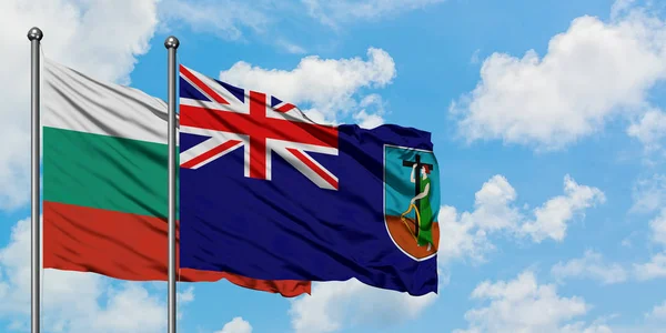 Bandera de Bulgaria y Montserrat ondeando en el viento contra el cielo azul nublado blanco juntos. Concepto diplomático, relaciones internacionales . — Foto de Stock