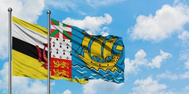 Brunei ve Saint Pierre ve Miquelon bayrağı birlikte beyaz bulutlu mavi gökyüzüne karşı rüzgarda sallayarak. Diplomasi kavramı, uluslararası ilişkiler.