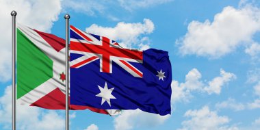 Burundi ve Heard Adası ve Mcdonald Adaları bayrağı birlikte beyaz bulutlu mavi gökyüzüne karşı rüzgarda sallayarak. Diplomasi kavramı, uluslararası ilişkiler.