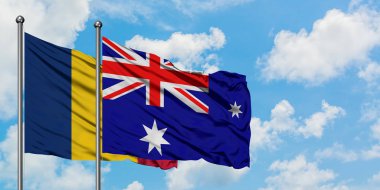 Çad ve Heard Adası ve Mcdonald Adaları bayrağı birlikte beyaz bulutlu mavi gökyüzüne karşı rüzgarda sallayarak. Diplomasi kavramı, uluslararası ilişkiler.