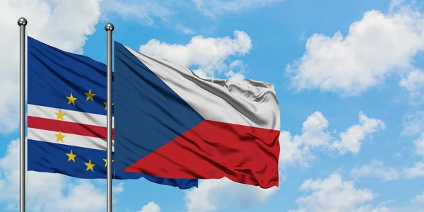 Bandera de Cabo Verde y República Checa ondeando en el viento contra el cielo azul nublado blanco juntos. Concepto diplomático, relaciones internacionales . — Foto de Stock