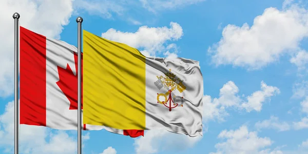 Bandera de Canadá y Ciudad del Vaticano ondeando en el viento contra el cielo azul nublado blanco juntos. Concepto diplomático, relaciones internacionales . — Foto de Stock