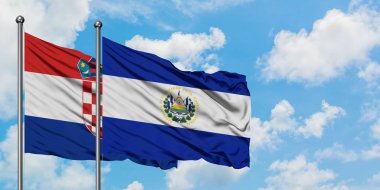 Hırvatistan ve El Salvador bayrağı birlikte beyaz bulutlu mavi gökyüzüne karşı rüzgarda sallayarak. Diplomasi kavramı, uluslararası ilişkiler.