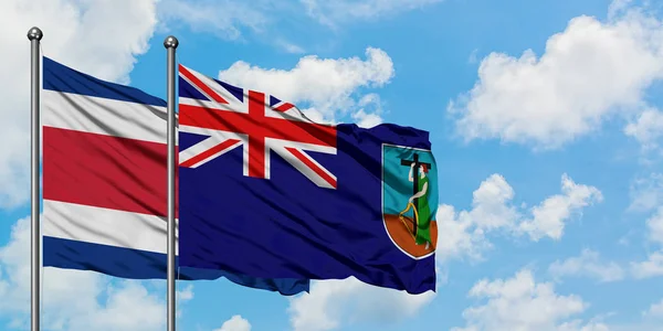 Bandera de Costa Rica y Montserrat ondeando en el viento contra el cielo azul nublado blanco juntos. Concepto diplomático, relaciones internacionales . —  Fotos de Stock