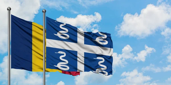 Chad and Martinique flag waving in the wind against white cloudy blue sky together. Diplomacy concept, international relations. — Stock Photo, Image