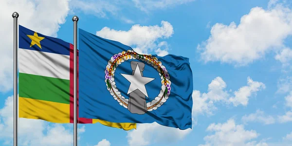 Central African Republic and Northern Mariana Islands flag waving in the wind against white cloudy blue sky together. Diplomacy concept, international relations. — Stock Photo, Image