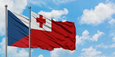 Çek Cumhuriyeti ve Tonga bayrağı birlikte beyaz bulutlu mavi gökyüzüne karşı rüzgarda sallayarak. Diplomasi kavramı, uluslararası ilişkiler.