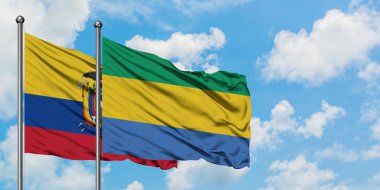 Ekvador ve Gabon bayrağı birlikte beyaz bulutlu mavi gökyüzüne karşı rüzgarda sallayarak. Diplomasi kavramı, uluslararası ilişkiler.