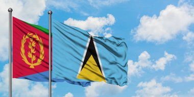 Eritre ve Saint Lucia bayrağı birlikte beyaz bulutlu mavi gökyüzüne karşı rüzgarda sallayarak. Diplomasi kavramı, uluslararası ilişkiler.