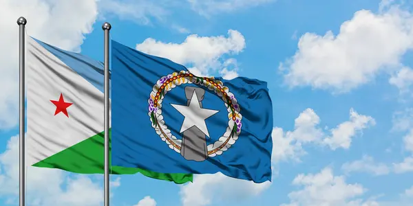 Джибути и флаг Северных Марианских островов, размахивая ветром против белого облачно-синего неба вместе. Концепция дипломатии, международные отношения . — стоковое фото