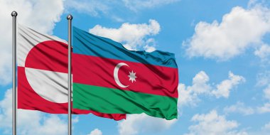 Grönland ve Azerbaycan bayrağı havada havada sallanıyor. Diplomasi kavramı, uluslararası ilişkiler.