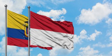 Ekvador ve Endonezya bayrağı birlikte beyaz bulutlu mavi gökyüzüne karşı rüzgarsal sallayarak. Diplomasi kavramı, uluslararası ilişkiler.