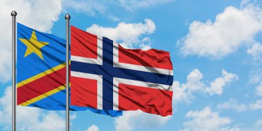 Kongo ve Bouvet Adaları bayrağı birlikte beyaz bulutlu mavi gökyüzüne karşı rüzgarda sallayarak. Diplomasi kavramı, uluslararası ilişkiler.