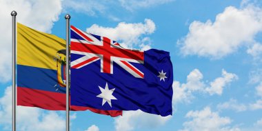 Ekvador ve Heard Adası ve Mcdonald Adaları bayrağı birlikte beyaz bulutlu mavi gökyüzüne karşı rüzgarda sallayarak. Diplomasi kavramı, uluslararası ilişkiler.