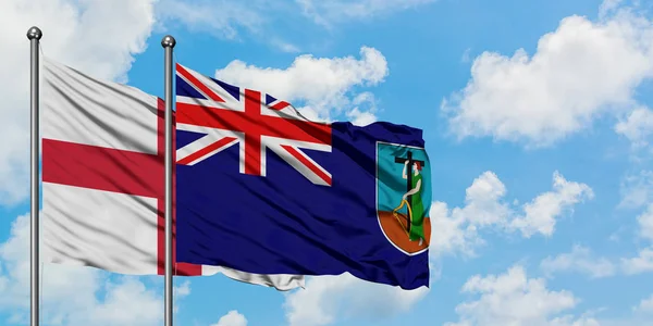 Engeland en Montserrat vlag zwaaien in de wind tegen witte bewolkte blauwe hemel samen. Diplomatie concept, internationale betrekkingen. — Stockfoto