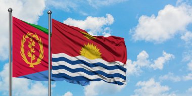 Eritre ve Kiribati bayrağı birlikte beyaz bulutlu mavi gökyüzüne karşı rüzgarda sallayarak. Diplomasi kavramı, uluslararası ilişkiler.