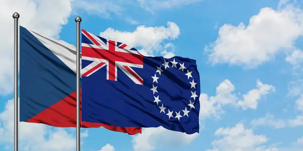 捷克共和国和库克群岛国旗在风中飘扬，与白云蓝天相得飞。外交概念、国际关系. — 图库照片