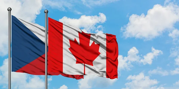 Bandera de la República Checa y Canadá ondeando en el viento contra el cielo azul nublado blanco juntos. Concepto diplomático, relaciones internacionales . — Foto de Stock