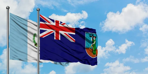 Bandera de Guatemala y Montserrat ondeando en el viento contra el cielo azul nublado blanco juntos. Concepto diplomático, relaciones internacionales . —  Fotos de Stock