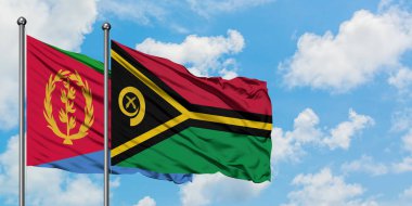 Eritre ve Vanuatu bayrağı birlikte beyaz bulutlu mavi gökyüzüne karşı rüzgarda sallayarak. Diplomasi kavramı, uluslararası ilişkiler.