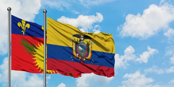 Guadalupe y la bandera de Ecuador ondeando en el viento contra el cielo azul nublado blanco juntos. Concepto diplomático, relaciones internacionales . — Foto de Stock