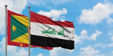 Grenada ve Irak bayrağı birlikte beyaz bulutlu mavi gökyüzüne karşı rüzgarda sallayarak. Diplomasi kavramı, uluslararası ilişkiler.