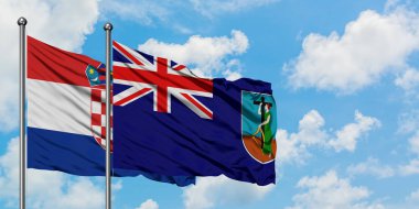 Hırvatistan ve Montserrat bayrağı birlikte beyaz bulutlu mavi gökyüzüne karşı rüzgarda sallayarak. Diplomasi kavramı, uluslararası ilişkiler.