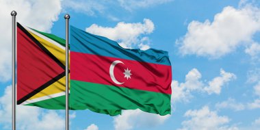 Guyana ve Azerbaycan bayrağı havada havada dalgalanıyor lar. Diplomasi kavramı, uluslararası ilişkiler.