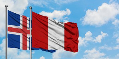 İzlanda ve Peru bayrağı birlikte beyaz bulutlu mavi gökyüzüne karşı rüzgarda sallayarak. Diplomasi kavramı, uluslararası ilişkiler.