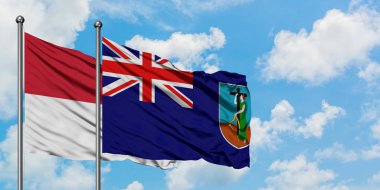 Irak ve Montserrat bayrağı birlikte beyaz bulutlu mavi gökyüzüne karşı rüzgarda sallayarak. Diplomasi kavramı, uluslararası ilişkiler.