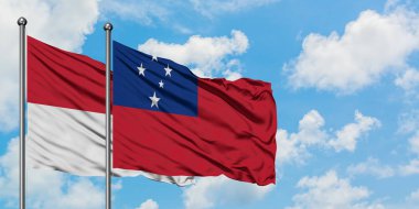 Irak ve Samoa bayrağı birlikte beyaz bulutlu mavi gökyüzüne karşı rüzgarda sallayarak. Diplomasi kavramı, uluslararası ilişkiler.