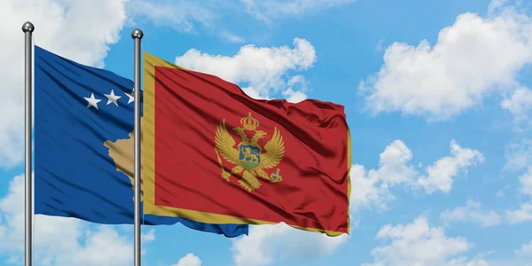 Kosovo and Montenegro flag waving in the wind against white cloudy blue sky together. Diplomacy concept, international relations. — Stock Photo, Image