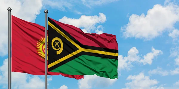 Kyrgyzstan and Vanuatu flag waving in the wind against white cloudy blue sky together. Diplomacy concept, international relations. — Stock Photo, Image