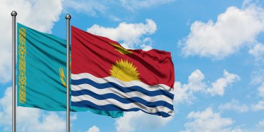 Kazakistan ve Kiribati bayrağı birlikte beyaz bulutlu mavi gökyüzüne karşı rüzgarsal sallayarak. Diplomasi kavramı, uluslararası ilişkiler.