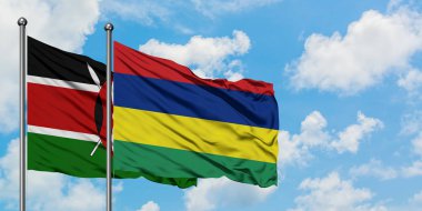 Kenya ve Mauritius bayrağı birlikte beyaz bulutlu mavi gökyüzüne karşı rüzgarda sallayarak. Diplomasi kavramı, uluslararası ilişkiler.